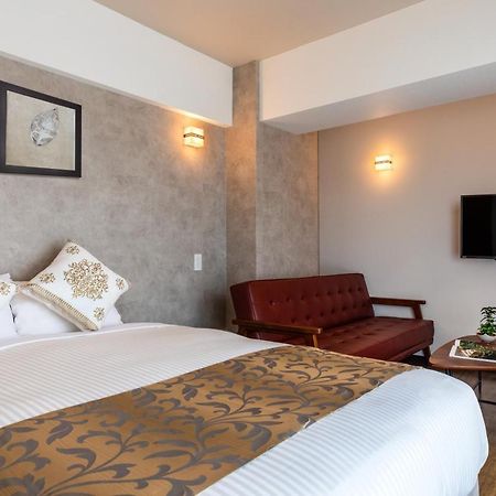 Aparthotel Mr Kinjo 万座ビーチ前 à Onna Extérieur photo
