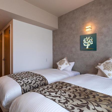 Aparthotel Mr Kinjo 万座ビーチ前 à Onna Extérieur photo