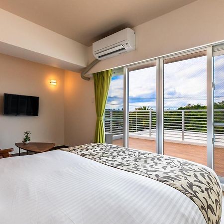 Aparthotel Mr Kinjo 万座ビーチ前 à Onna Extérieur photo