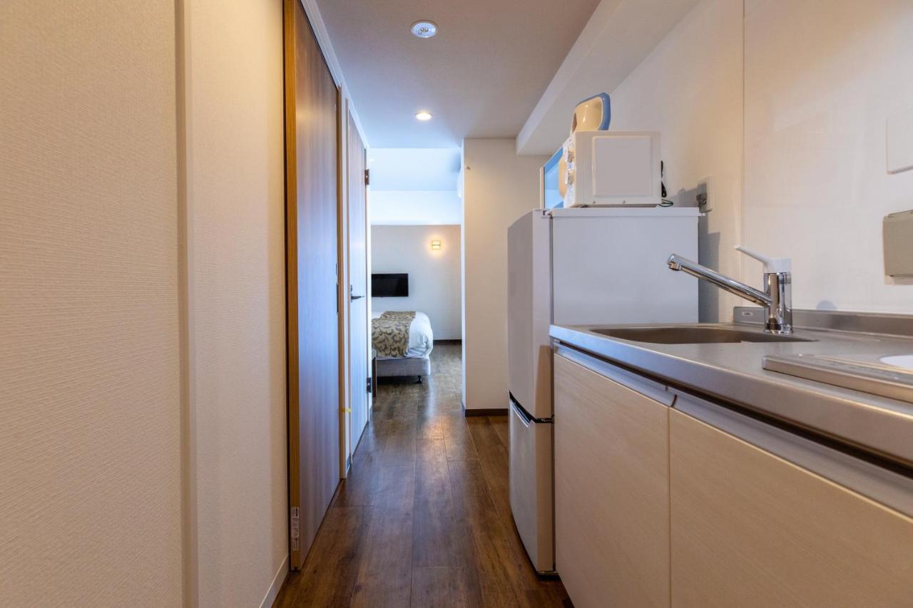 Aparthotel Mr Kinjo 万座ビーチ前 à Onna Extérieur photo